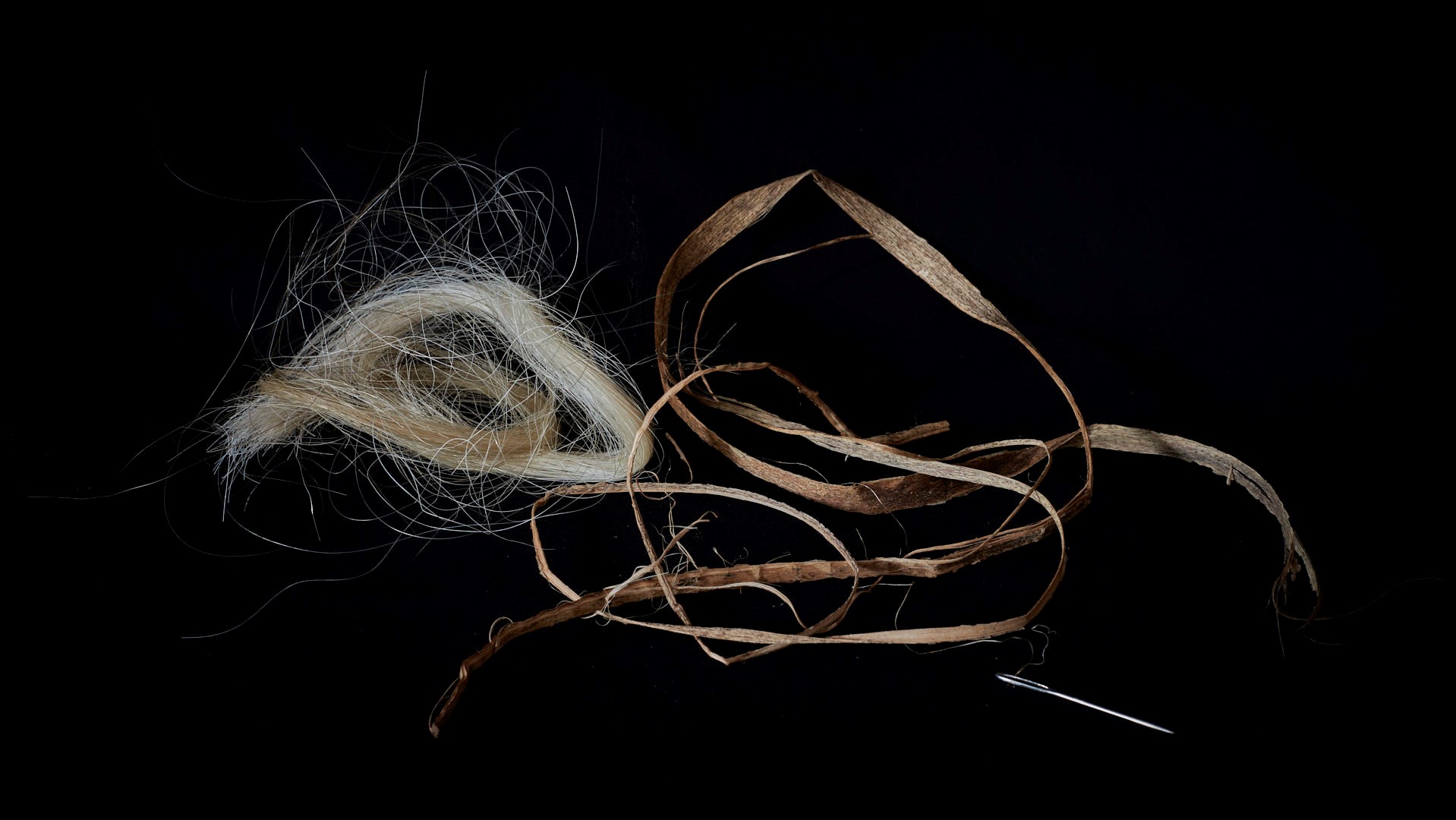 Ancient threads, horse hair, sisal and needle