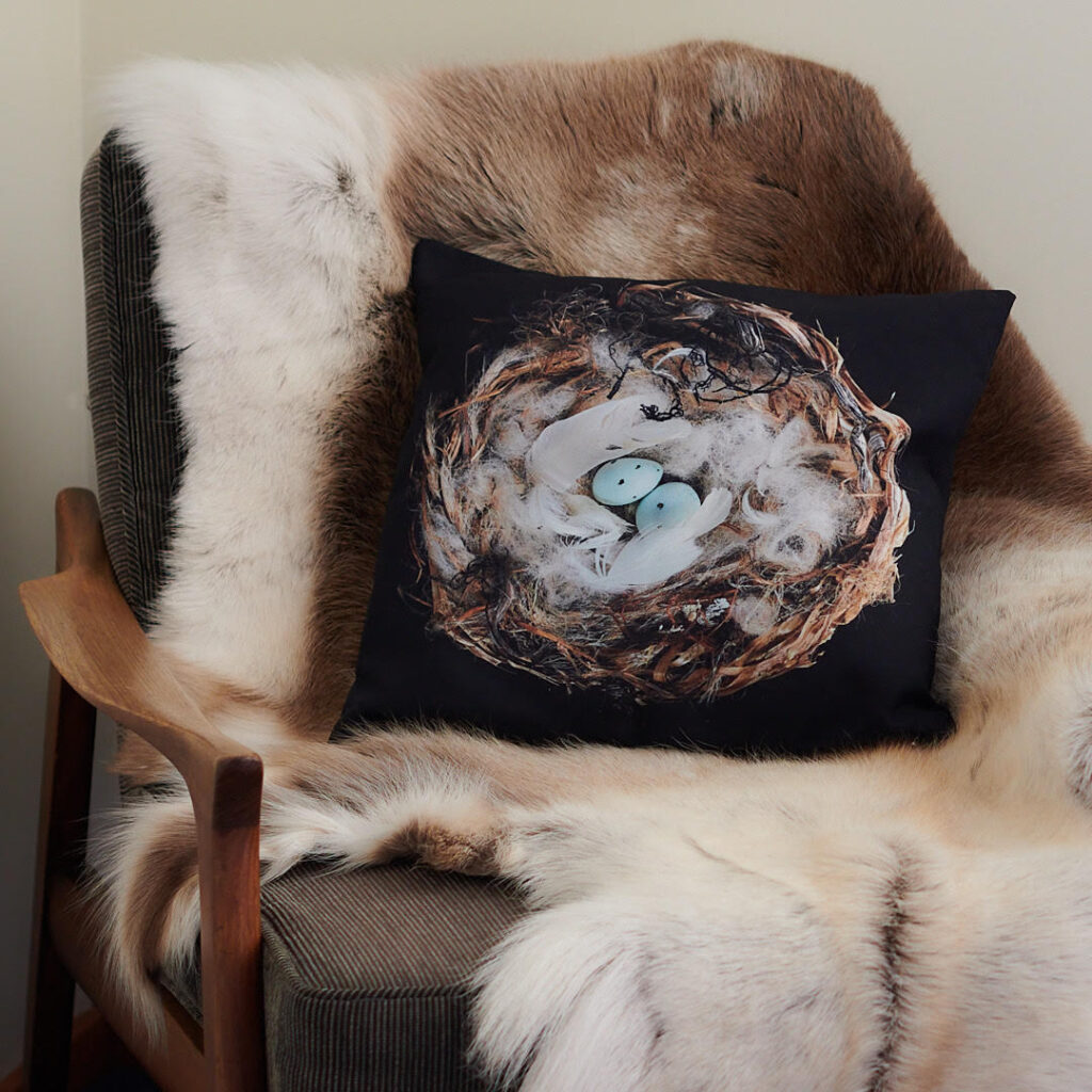 Testament to Resilience - Hoary Redpoll Nest Sculpture by Zora Verona on Designer Cushion